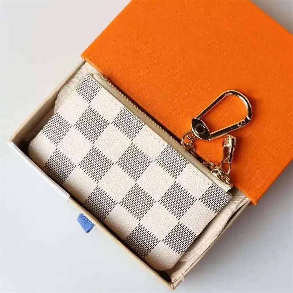 DRAGONNE KEY HOLDER Keychains Accessories Designer wallet Floral Canvas Keychain Car Key Chain Ring Charm Pochette Accessoires essential Tag Bag Stamping Stamp 02 - 3 of 8