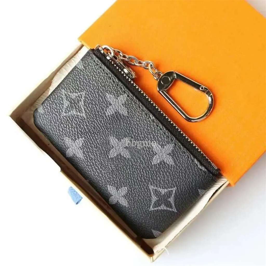DRAGONNE KEY HOLDER Keychains Accessories Designer wallet Floral Canvas Keychain Car Key Chain Ring Charm Pochette Accessoires essential Tag Bag Stamping Stamp 02 - 2 of 8