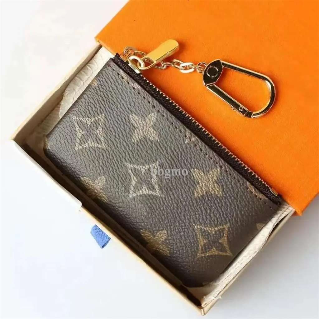 DRAGONNE KEY HOLDER Keychains Accessories Designer wallet Floral Canvas Keychain Car Key Chain Ring Charm Pochette Accessoires essential Tag Bag Stamping Stamp 02 - 7 of 8