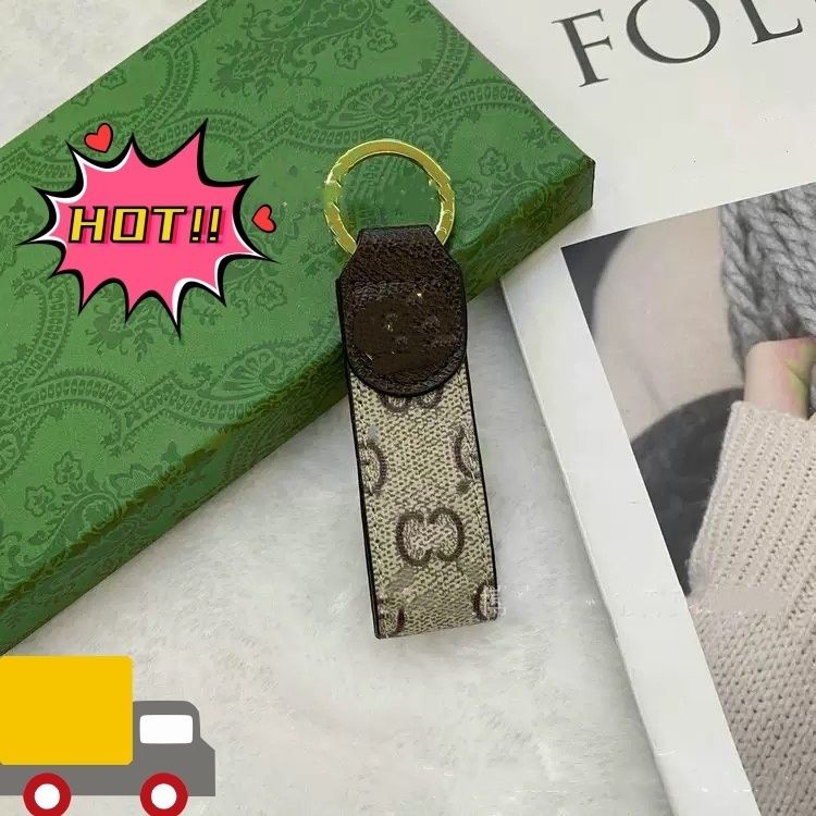 Designer Keychain Two items cheaper Fashion Men Women purse Keychain luxury High Quality Leather Bag Lanyard Gold Plated Key chain Car bag charm with box TOP001 - 6 of 9