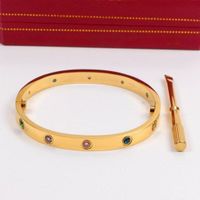wide gold with colored diamond