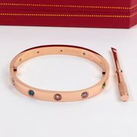 wide rose gold with colored diamond