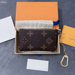 DRAGONNE KEY HOLDER Keychains Accessories Designer wallet Floral Canvas Keychain Car Key Chain Ring Charm Pochette Accessoires essential Tag Bag Stamping Stamp 02 - denook
